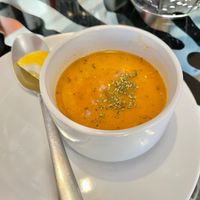 Lentil soup. Would have been better without the oil, but nice flavour and great add with the lemon wedge  at Le Mezze du Chef - Menilmontant in Paris