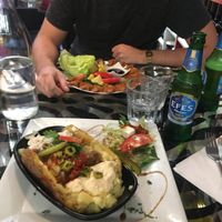 Kumpir in front & cig Kofte plate behind at Le Mezze du Chef - Menilmontant in Paris