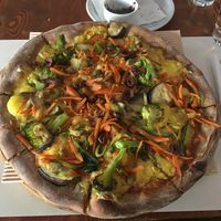 Vegan green pizza at Mystic All Day Cafe in Athens