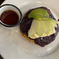 Pancakes with winter berries and maple syrup 😋   at The Pitted Date in Playa Del Carmen