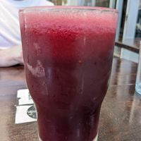 Red juice at The Pitted Date in Playa Del Carmen