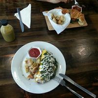 Vegan omelette and croissant sandwich at The Pitted Date in Playa Del Carmen