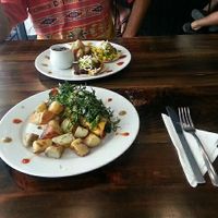 Taquitos, roasted potatoes and salad at The Pitted Date in Playa Del Carmen