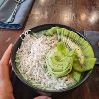 "green is the new black" smoothie bowl - so delicious! at The Pitted Date in Playa Del Carmen