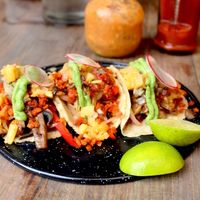 Vegan chorizo tacos with veggies and pineapple at The Pitted Date in Playa Del Carmen
