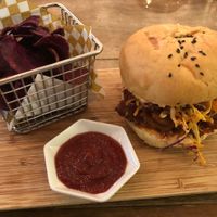 Chat fruit burger with sweet potato chips at The Pitted Date in Playa Del Carmen