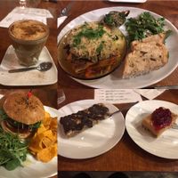 Lasagne, burger, fudge and cranberry sauce dessert, muesli bar, almond and cinnamon latte  at Kaffi Vinyl in Reykjavik