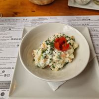 Starter - dish of the day with bread at Hicuri in Granada