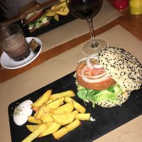 The chick'n style burger with fries and vegan mayo. at Hicuri in Granada