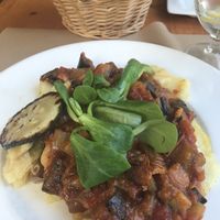 Pisto (ratatouille) on potato.  at Hicuri in Granada