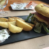 hicuri burger with fries and aioli  at Hicuri in Granada