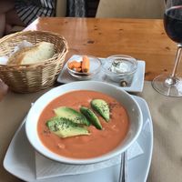 Salmorejo con avocado y vino de la casa  at Hicuri in Granada
