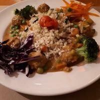 Veggie meatless balls and brown rice at Hicuri in Granada