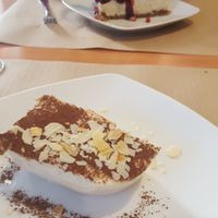 Desserts -- almond tiramisu and cheese cake at Hicuri in Granada