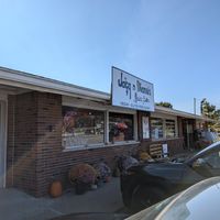 Front; has parking lot at Jacq N Diane's Juice Box in Holly