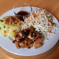 Tofuskin with fried rice and salad (#13 on lunch menu) at Loving Hut in Hamburg