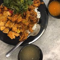 Economy rice: white rice with stewed greens and tofu, braised tofu, fried bitter gourd and winter melon and sweet corn soup. Self-serve chilli sauce in a separate bowl.  at Veggie Time in Kota Kinabalu