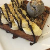 waffles with black sesame ice cream, bananas and chocolate sauce  at LN Fortunate Coffee - Solaris Mont Kiara in Kuala Lumpur