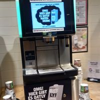 coffe machine with oat milk (🚨the cocoa powder contains milk powder, so it's never vegan🚨) at backWERK - Hauptbahnhof in Berlin