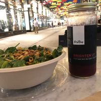 Spicy greens salad + brighten up juice + lovely outdoor seating  at Fruitive - Palmer Alley in Washington