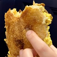 Breakfast Sandwich. House made vegan sausage, oat cheese, chickpea tofu egg, pickles, and tomato mayo on ciabatta. Highly recommend   at B52 Cafe in Pittsburgh