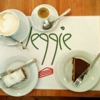 Enjoying cakes and coffee at Veggie Nyers in Budapest