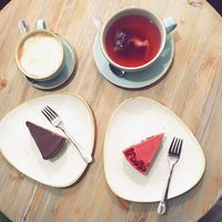 Hot beverages and delicious raw vegan cheesecakes. at Veggie Nyers in Budapest