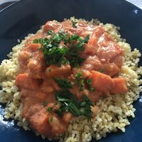 Senagalese stew with sweet potatoes, white beans, tomato, and peanut butter over buckwheat. So good.  at Smaki Roslinne in Krakow