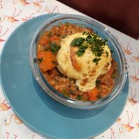 Buckweat with vegetables and mashed potatoes on top. at Smaki Roslinne in Krakow