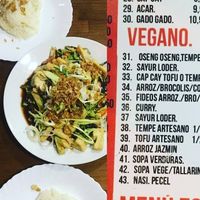 Tofu noodle dish and rice with the vegan options highlighted on the menu at Casa Ari in Gran Canaria