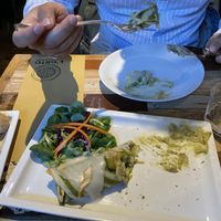 Crespella arrotolata di farina integrale, ripiena d crema di piselli, tofu affumicato, menta, patate e porri  at L'Orto Gia Salsamentario in Turin