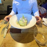 Spaghetti di zucchine marinati al lime, serviti con pesto di basilico, pinoli e anacardi  at L'Orto Gia Salsamentario in Turin