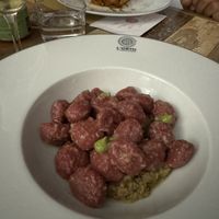 Gnocchi di barbabietola con sugo super top! Ricorda un ragù bianco, ovviamente vegan  at L'Orto Gia Salsamentario in Turin