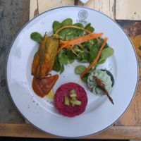 Appetizers : fig with cream, stuffed zucchini flower, tartare at L'Orto Gia Salsamentario in Turin
