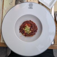 First course : tagliatelle, processed with blueberries, and tomato sauce at L'Orto Gia Salsamentario in Turin