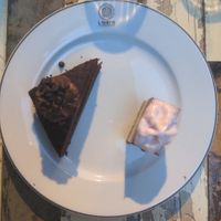 Desserts : chocolate cake and raw blueberry cake at L'Orto Gia Salsamentario in Turin