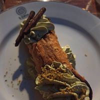 Cannolo con crema di mandorle e pistacchio at L'Orto Gia Salsamentario in Turin