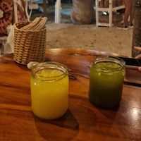 Orange juice and cucumber lime water at Burrito Amor in Tulum