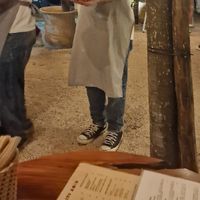 Waiter with burritos at Burrito Amor in Tulum