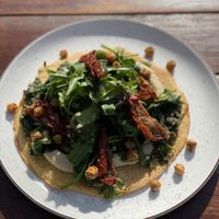 Socca Chickpea pancake wirh hummus & pesto  at SUE in Rotterdam