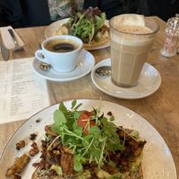 Scrambled egg, dirty chai, americano & socca  at SUE in Rotterdam