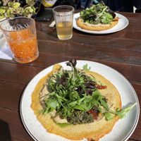 Chickpeas pancake and carrot ginger juice   at SUE in Rotterdam