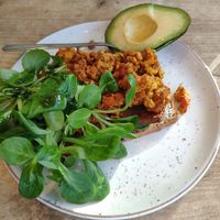Scrambled "egg" with avocado at SUE in Rotterdam