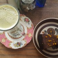 vegan orange chocolate cake and matcha latte at The Natural Food Deli in Petersfield