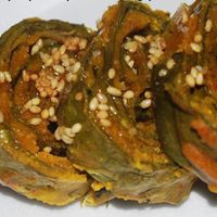 Alu Wadi - Taro leave interleaved with chick pea flour, tarmarind and tempered with linseed. Great VEGAN item with a tangy taste! at Saattveek in Auckland