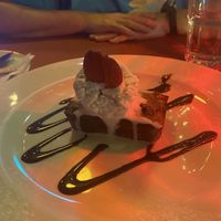 Vegan Banana: banana bread topped with vanilla ice cream and strawberries   at Piola in Playa Del Carmen