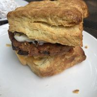 Biscuit breakfast sandwich had to be eaten with a fork and knife!  at Reverie Cafe + Bar in Minneapolis