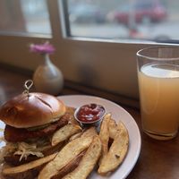 Reverie Cafe and Bar - Nashville “Chicken” Sandwich and potato wedges  at Reverie Cafe + Bar in Minneapolis