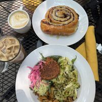 market hash and huge cinnamon roll  at Reverie Cafe + Bar in Minneapolis