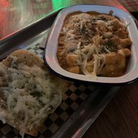 Mac and cheese with garlic bread. They didn’t question our Canadian request for ketchup to eat on it. It was good but not great.   at Lucky Pig - Paradise Palms in Edinburgh